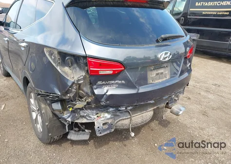 2014 Hyundai Santa Fe Sport 2.4L z USA, uszkodzony, nr VIN 5XYZU3LB1EG218928